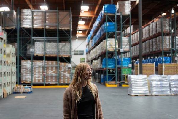 Mara Sleeter, marketing and communications project manager, is interviewed in the San Francisco-Marin Food Bank warehouse in San Francisco, Wednesday, July 2, 2025. (AP Photo/Jeff Chiu)
