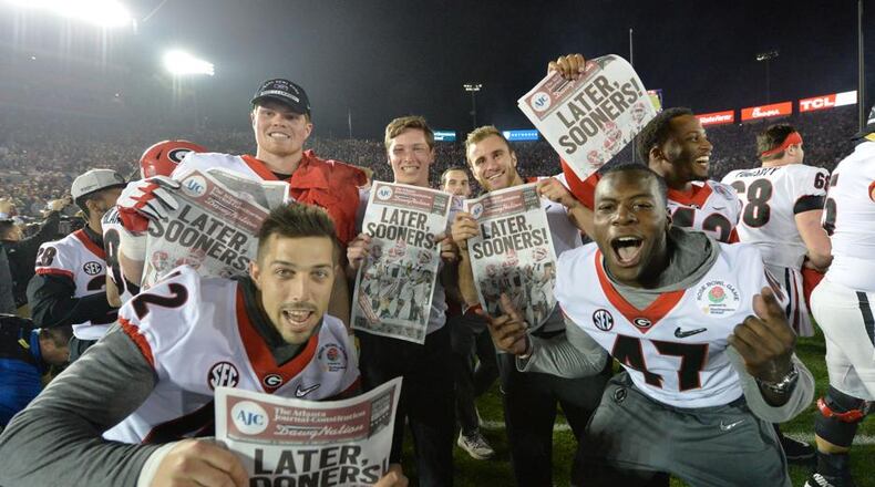Georgia players celebrates their victory over Oklahoma in the Rose Bowl. Hyosub Shin/AJC