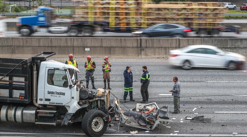 Officers were called to a wreck on I-285 East just before the I-85 interchange around 6:45 a.m. Tuesday after a dump truck hit another commercial truck.