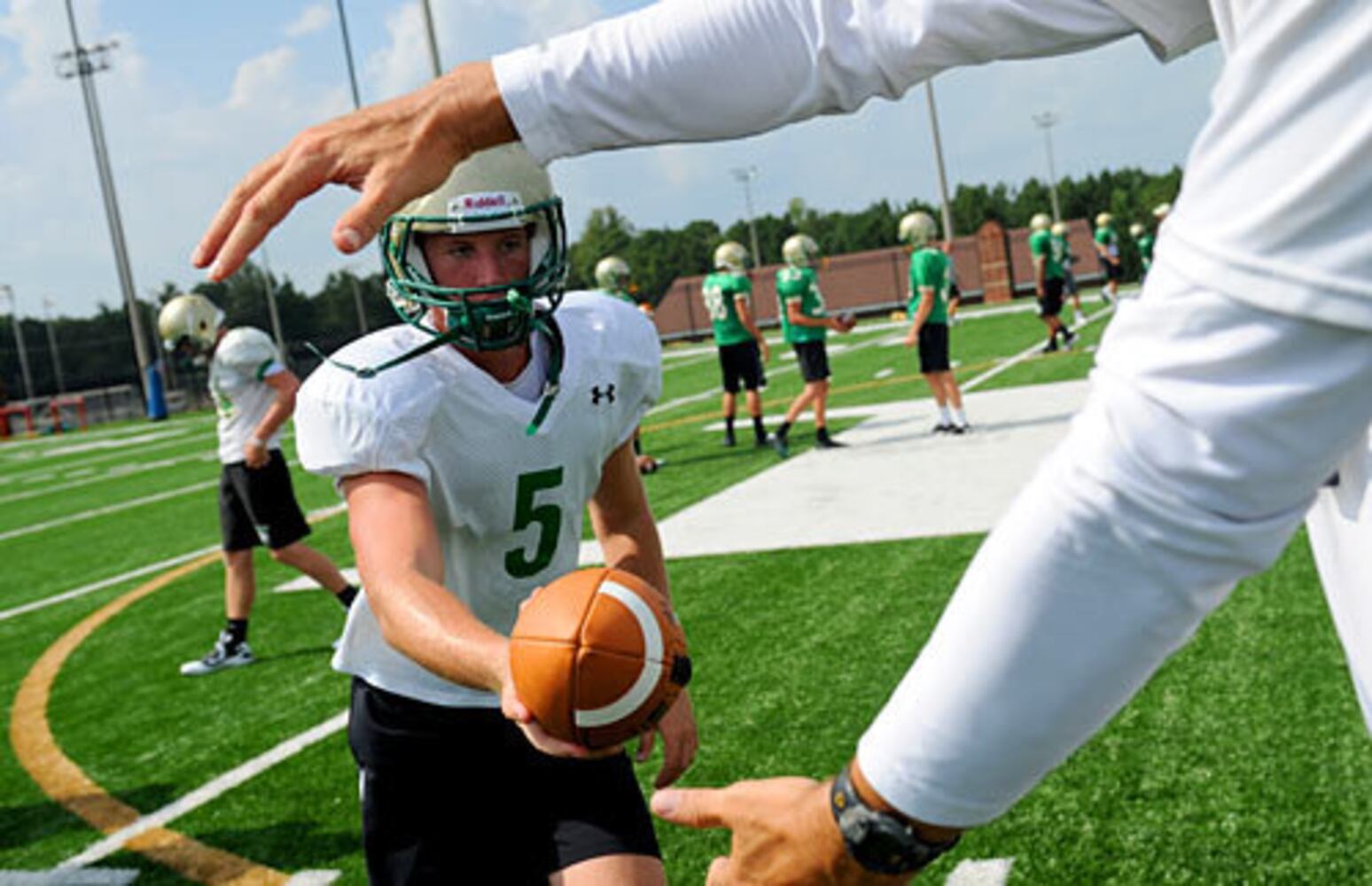 High school football: Summer workouts