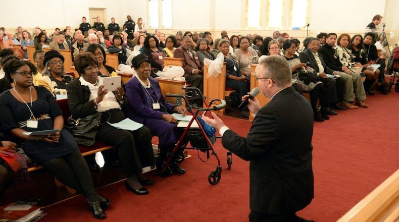 Rev. Brian Germano of First United Methodist Church of LaGrange apologizes during a service Saturday where several white religious leaders in the city acknowledge past lynchings and the white religious community’s silence about these crimes. KENT D. JOHNSON/AJC