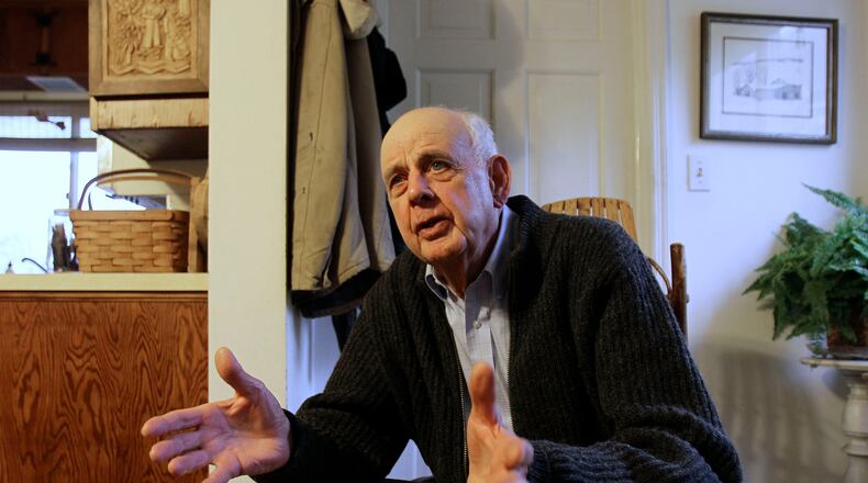 FILE - Wendell Berry talks with a reporter at his home in Port Royal, Ky., March 10, 2011. (AP Photo/Ed Reinke, File)