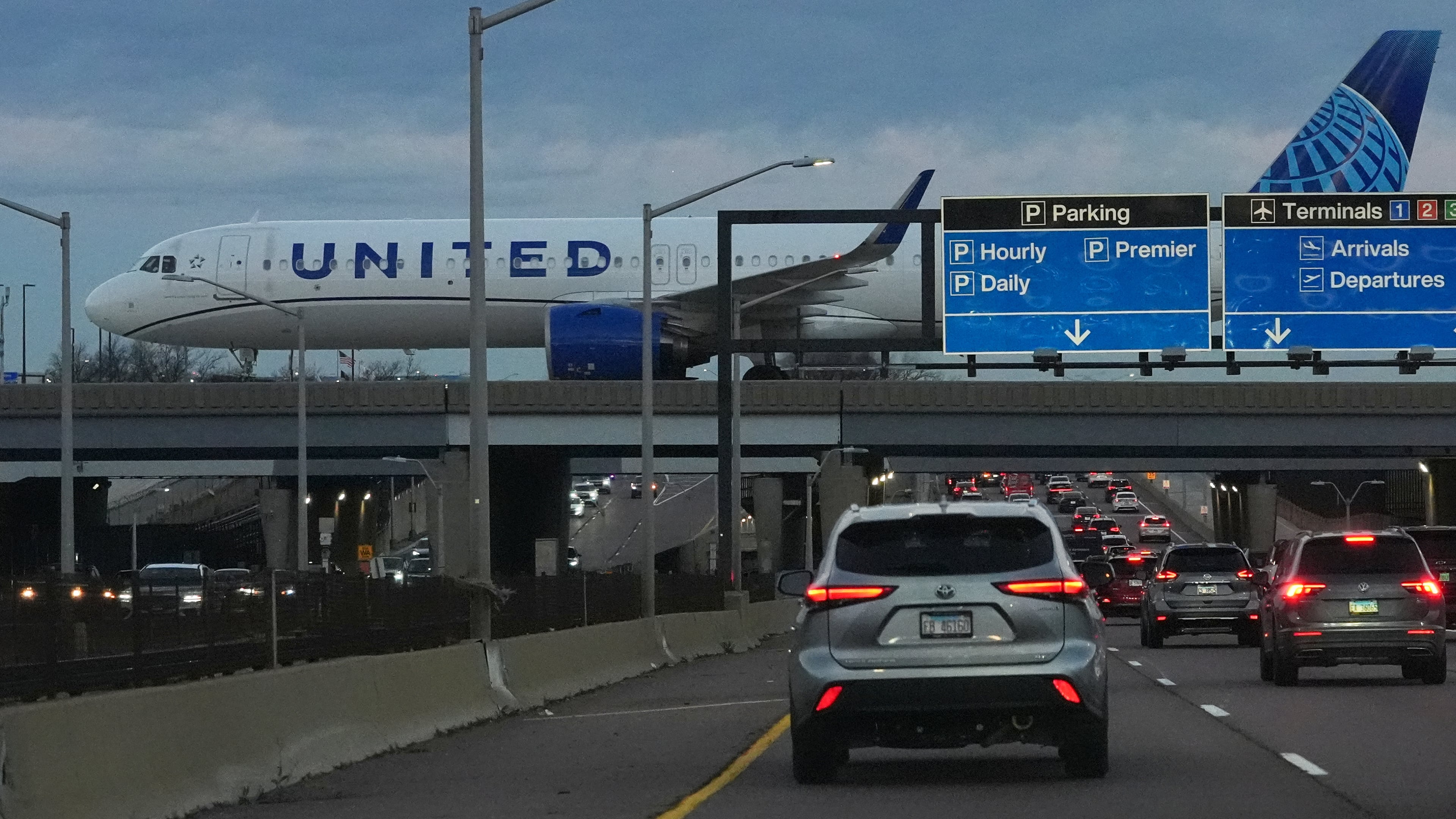 An United Airlines flight arrives at O'Hare International Airport in Chicago, Monday, Nov. 3, 2025. (AP Photo/Nam Y. Huh)