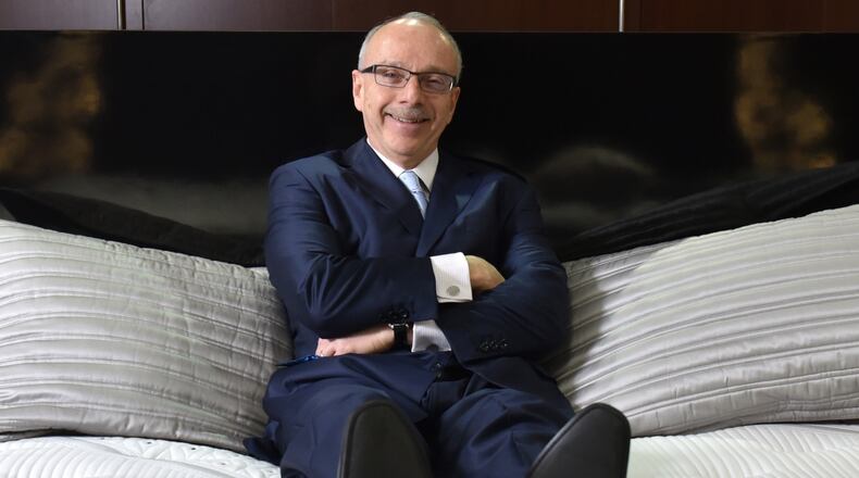 Gary Fazio, seen here checking out one of the products, will retire at year's end.