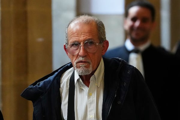 Defendant Aomar Aït Khedache, one of the men accused in the 2016 armed robbery of Kim Kardashian, leaves during a break at the palace of justice Monday, April 28, 2025 in Paris. (AP Photo/Aurelien Morissard)