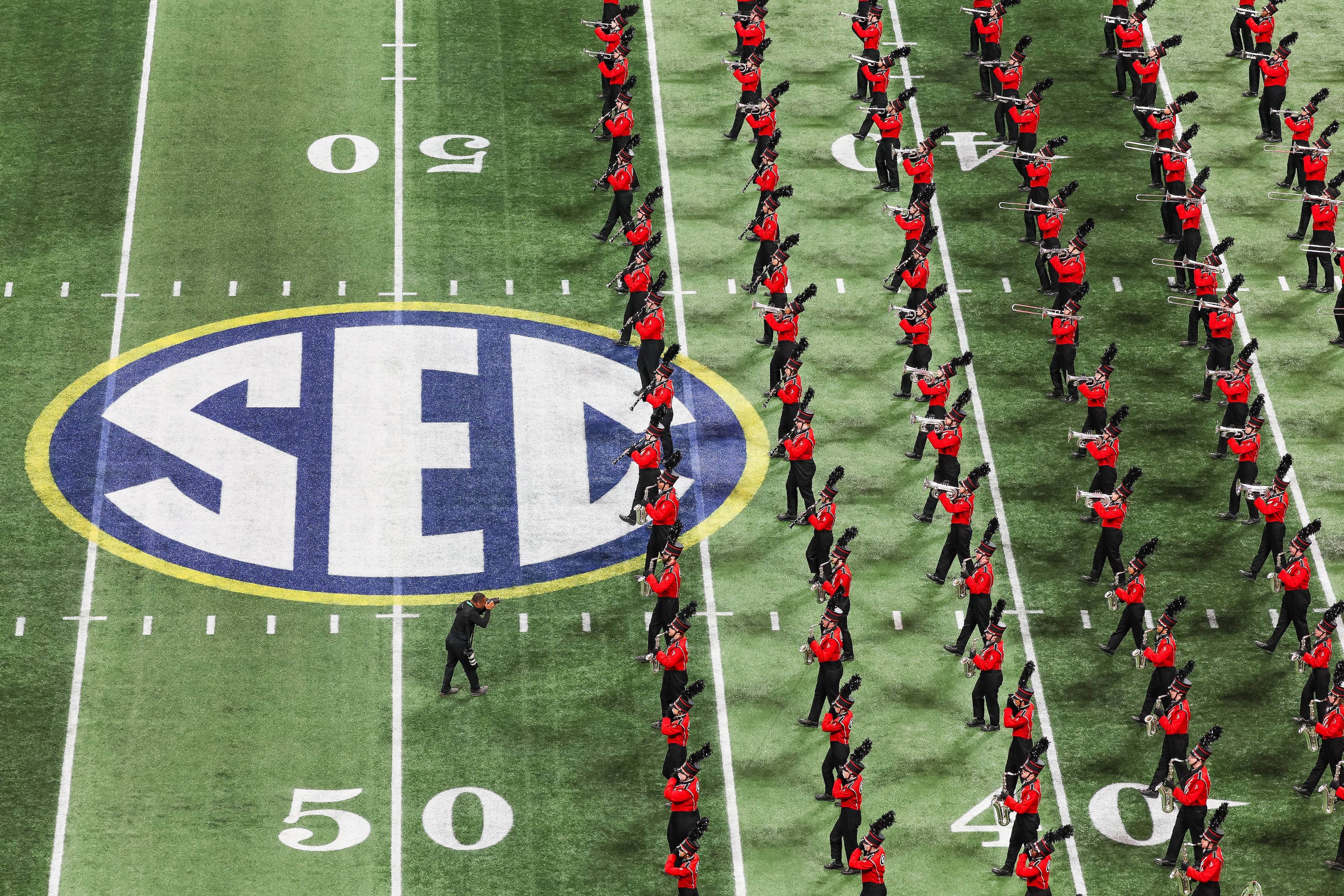 The Georgia marching band performs during the SEC Championship Game at Mercedes-Benz Stadium, Saturday, Dec. 6, 2025, in Atlanta. (Jason Getz / AJC)