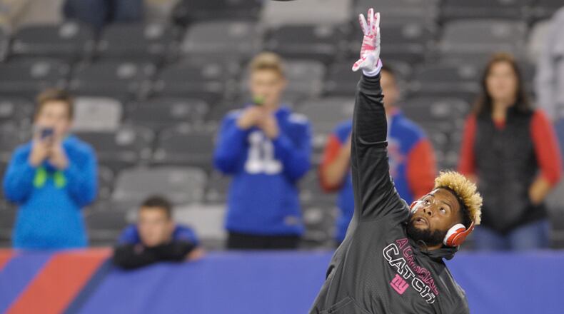 New York Giants wide receiver Odell Beckham Jr. warms up before playing against the San Francisco 49ers in an NFL football game, Sunday, Oct. 11, 2015, in East Rutherford, N.J. (AP Photo/Bill Kostroun)