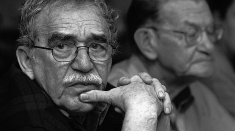 In this 2003 photo released by the Fundación Nuevo Periodismo Iberoamericano (FNPI), Colombian Nobel laureate Gabriel Garcia Marquez, left, is seen in Monterrey, Mexico. Behind is Colombian journalist Jose Salgar. Garcia Marquez died on Thursday, April 17, 2014 at his home in Mexico City. The author's magical realist novels and short stories exposed tens of millions of readers to Latin America's passion, superstition, violence and inequality. The FNPI was founded by Garcia Marquez. (AP Photo/Andres Reyes, FNPI) Learn more about Gabriel Garcia Marquez, left, in this photo tribute. The writer died on Thursday, April 17, 2014 at his home in Mexico City. (AP Photo/Andres Reyes, FNPI)
