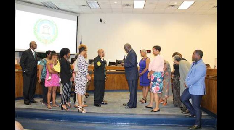 South Fulton Mayor Bill Edwards swears in Freddie Broome as the city's fire chief on Tuesday, June 11, 2019. Broome is coming from Valdosta.