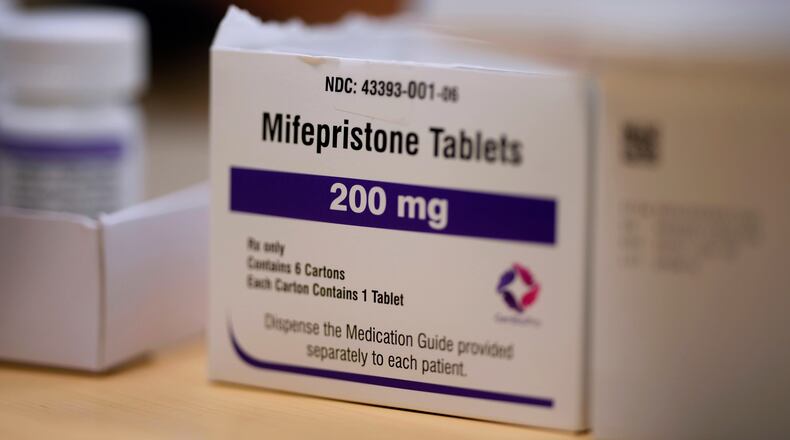 FILE - Mifepristone tablets sit on a table at a Planned Parenthood clinic in Ames, Iowa, July 18, 2024. (AP Photo/Charlie Neibergall, File)