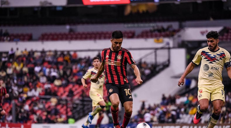 Atlanta United midfielder Gonzalo Martinez #10 dribbles the ball during the first half of the first leg match between Atlanta United FC and Club America in the quarterfinal round of the 2020 Scotiabank Concacaf Champions League at Estadio Azteca in Mexico City, Mexico, on Wednesday March 11, 2020. (Photo by Jacob Gonzalez/Atlanta United)