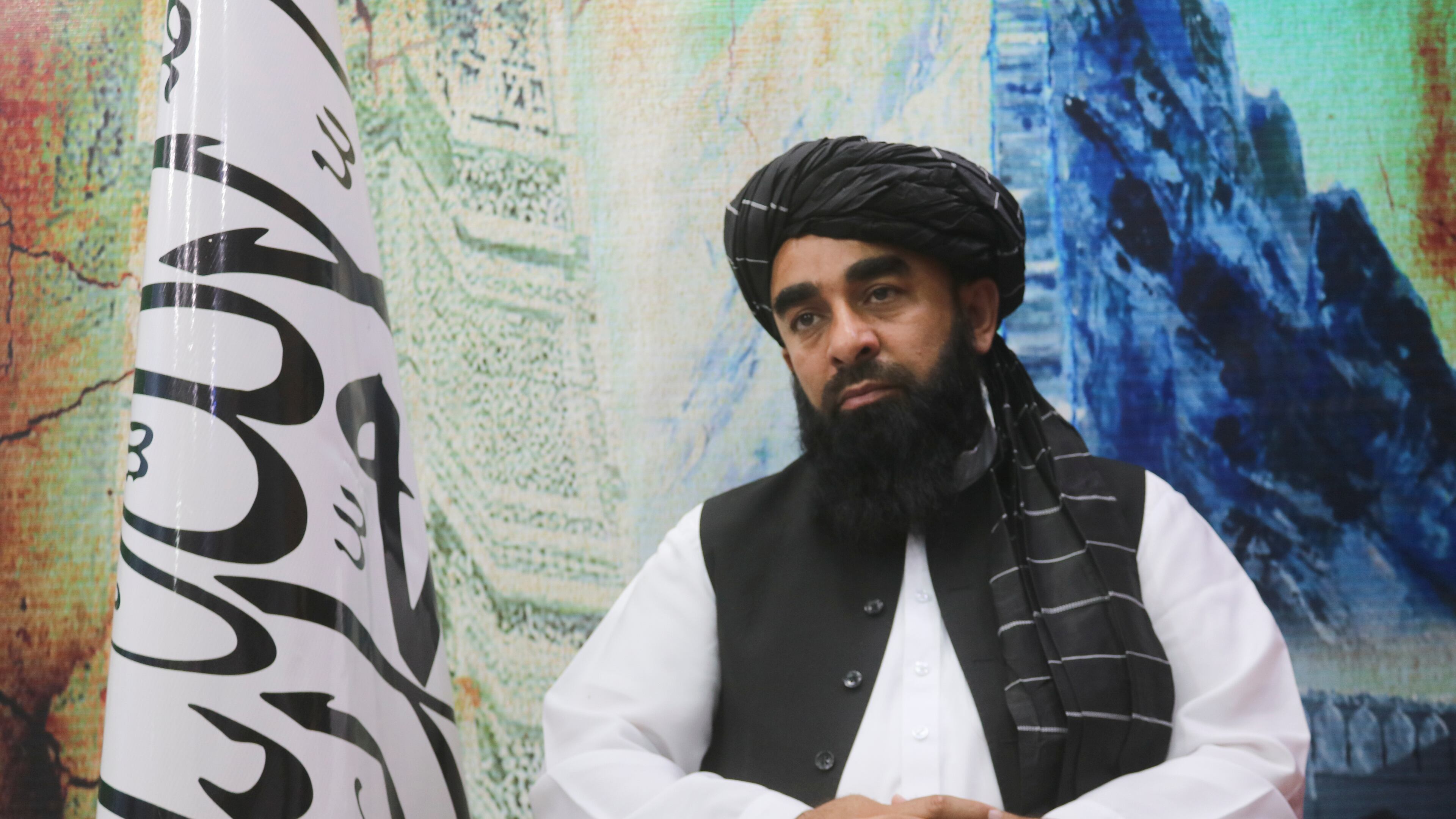 FILE - The Taliban's spokesman, Zabihullah Mujahid, sits during an interview in Kandahar, Afghanistan, on Aug. 14, 2023. (AP Photo/Abdul Khaliq, File)
