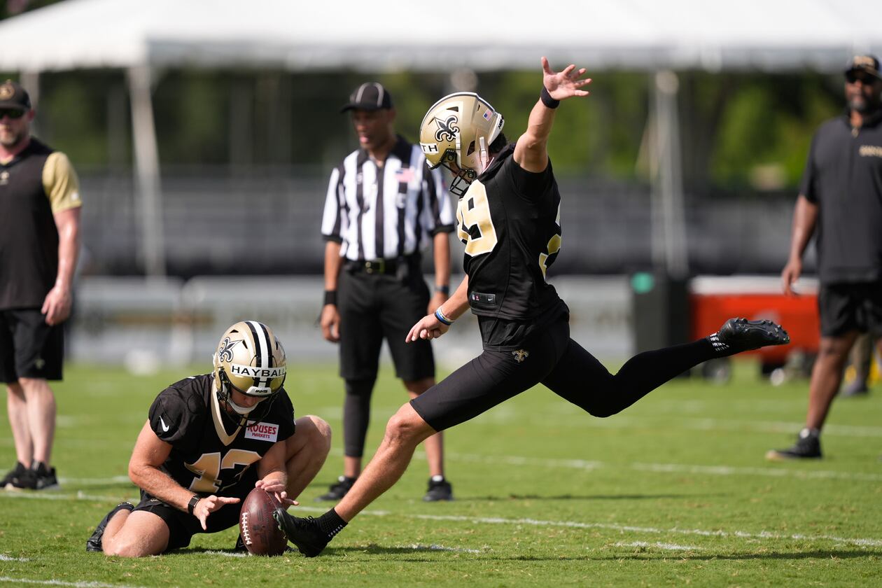 New Orleans Saints place kicker Charlie Smyth and holder Matthew Hayball go through drills during Back Together Weekend at the team's NFL football training camp in Metairie, La., Sunday, July 27, 2025. (Gerald Herbert/AP)