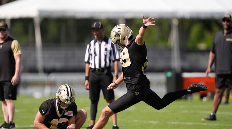 New Orleans Saints place kicker Charlie Smyth and holder Matthew Hayball go through drills during Back Together Weekend at the team's NFL football training camp in Metairie, La., Sunday, July 27, 2025. (Gerald Herbert/AP)