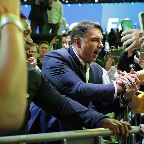 Brazilian Sen. Flavio Bolsonaro greets supporters as he arrives to the Liberal Party convention where he was confirmed as the party's presidential candidate, in Sao Paulo, Saturday, July 25, 2026. (AP Photo/Ettore Chiereguini)