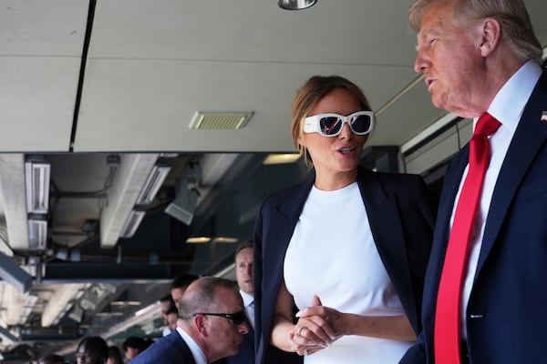 President Donald Trump, right, and first lady Melania Trump attend the Club World Cup final soccer match, at MetLife Stadium in East Rutherford, N.J., Sunday, July 13, 2025. (AP Photo/Jacquelyn Martin)
