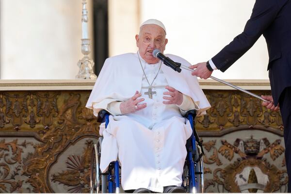 Pope Francis in a wheelchair speaks to faithful at the end of a mass in St. Peter's Square at The Vatican, Sunday, April 6, 2025, part of the Jubilee of the sick and the health workers. (AP Photo/Andrew Medichini)