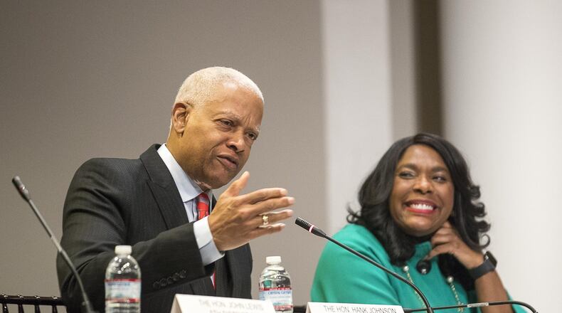 U.S. Rep. Terri Sewell (right), D-Ala., reacts to U.S. Rep. Hank Johnson, D-Ga., as he speaks during a hearing on voting rights on Feb. 19, 2019. Sewell is the sponsor of a bill that would restore the Voting Rights Act. ALYSSA POINTER / ALYSSA.POINTER@AJC.COM