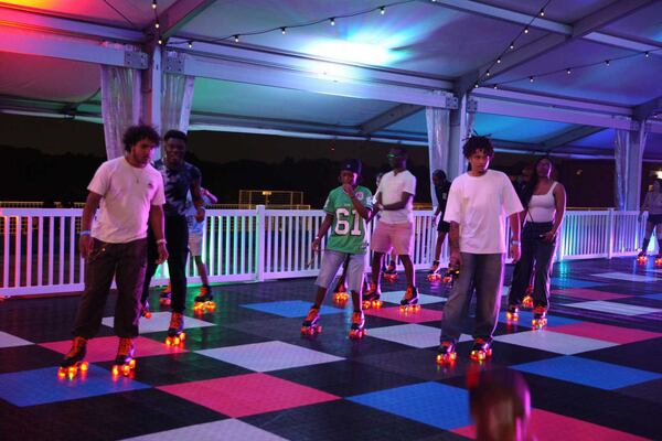 Ponce City Market — with its mix of shops, restaurants and popular rooftop amusement area with a skating rink — draws locals and tourists year-round. (Zaire Breedlove/AJC)