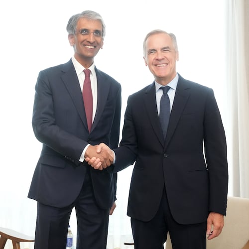 Canada Prime Minister Mark Carney, right, meets Chief Executive Officer of Temasek Holdings Dilhan Pillay in Toronto on Monday, Sept. 14, 2026. (Nathan Denette/The Canadian Press via AP)