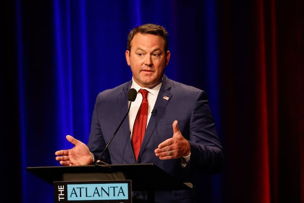 Republican candidate for governor Burt Jones, who is current lieutenant governor, takes the stage alone at the Atlanta Press Club Loudermilk-Young Debate Series at Georgia Public Broadcasting in Atlanta on June 1, 2026. His opponent Rick Jackson did not attend, citing a scheduling conflict. (Arvin Temkar/AJC)