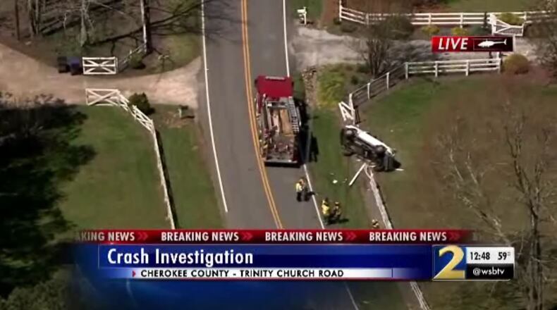 A person was reported trapped in a Cherokee County crash.