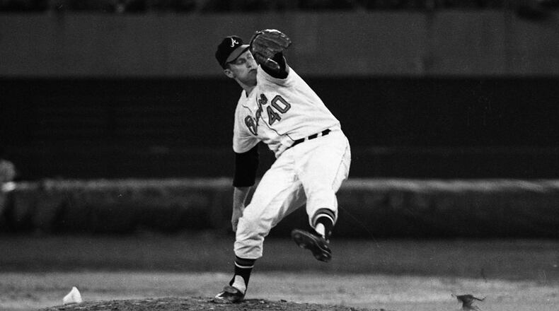 The Braves' Tony Cloninger throws a pitch during the first game at Atlanta Stadium in 1966. (AJC file photo)