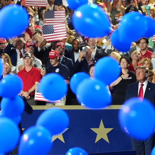 President Donald Trump watches as balloons fall at the Republican convention Thursday, Sept. 10, 2026, in Dallas. (AP Photo/Alex Brandon)