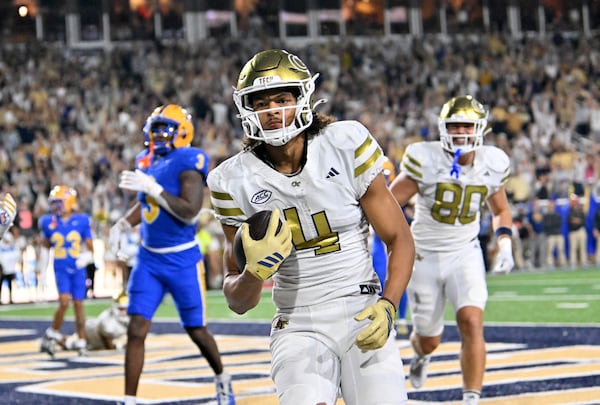 Georgia Tech wide receiver Isiah Canion (4) scores a touchdown during the second half in an NCAA college football game at Bobby Dodd Stadium, Saturday, November 22, 2025 in Atlanta. Pittsburgh won 42-28 over Georgia Tech. (Hyosub Shin / AJC)