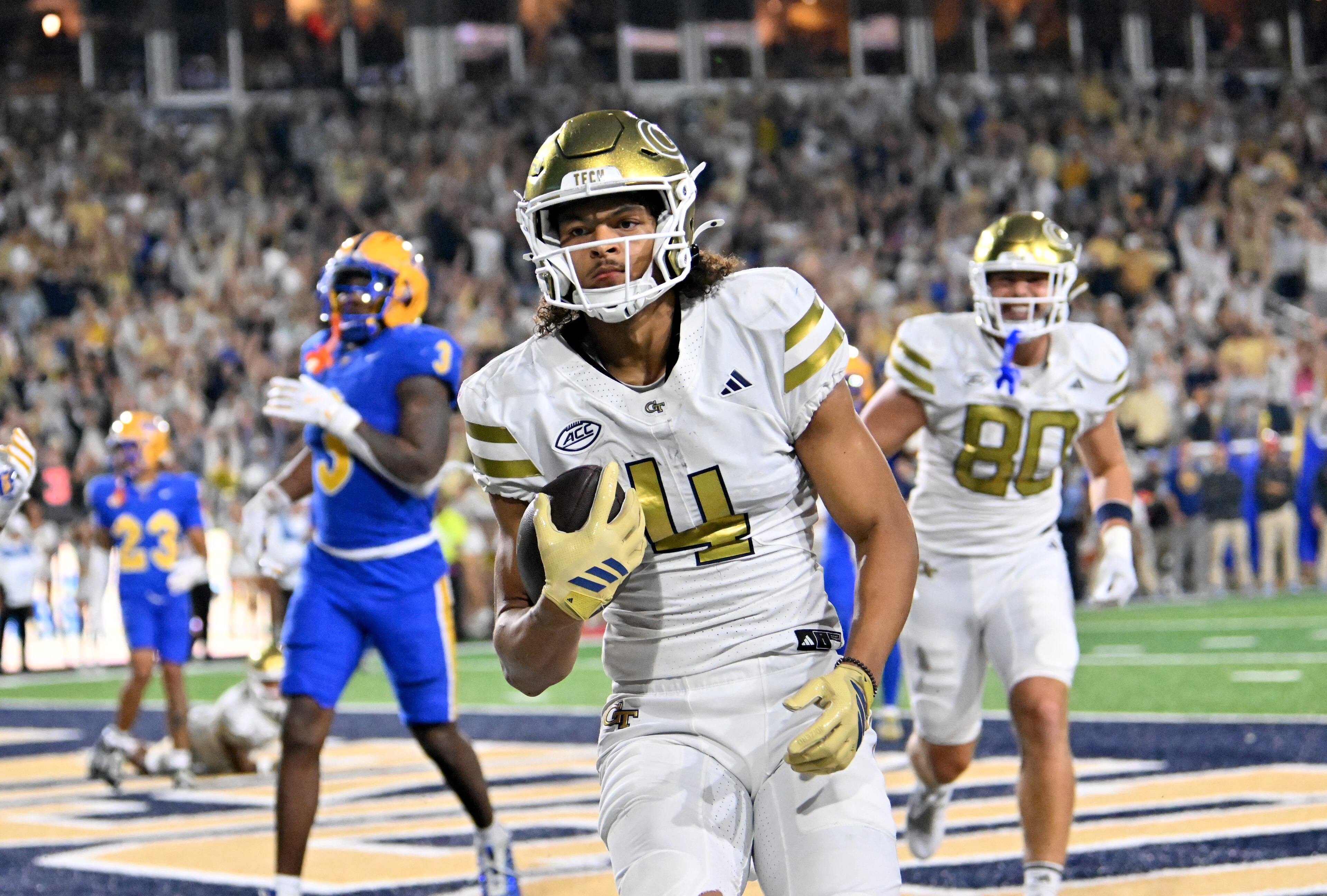 Georgia Tech wide receiver Isiah Canion (4) scores a touchdown during the second half in an NCAA college football game at Bobby Dodd Stadium, Saturday, November 22, 2025 in Atlanta. Pittsburgh won 42-28 over Georgia Tech. (Hyosub Shin / AJC)