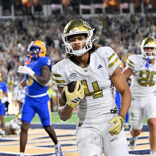 Georgia Tech wide receiver Isiah Canion — pictured scoring a touchdown against Pittsburgh in November — is doubtful to play in Saturday's Pop-Tarts Bowl. Canion leads the team with four TDs this season (Hyosub Shin/AJC)