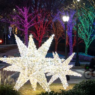 Lights are displayed outside of the Woodruff Arts Center near the intersection of Peachtree Street and 15th Street. (Ben Hendren for the AJC)