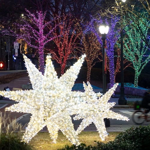 Lights are displayed outside of the Woodruff Arts Center near the intersection of Peachtree Street and 15th Street. (Ben Hendren for the AJC)