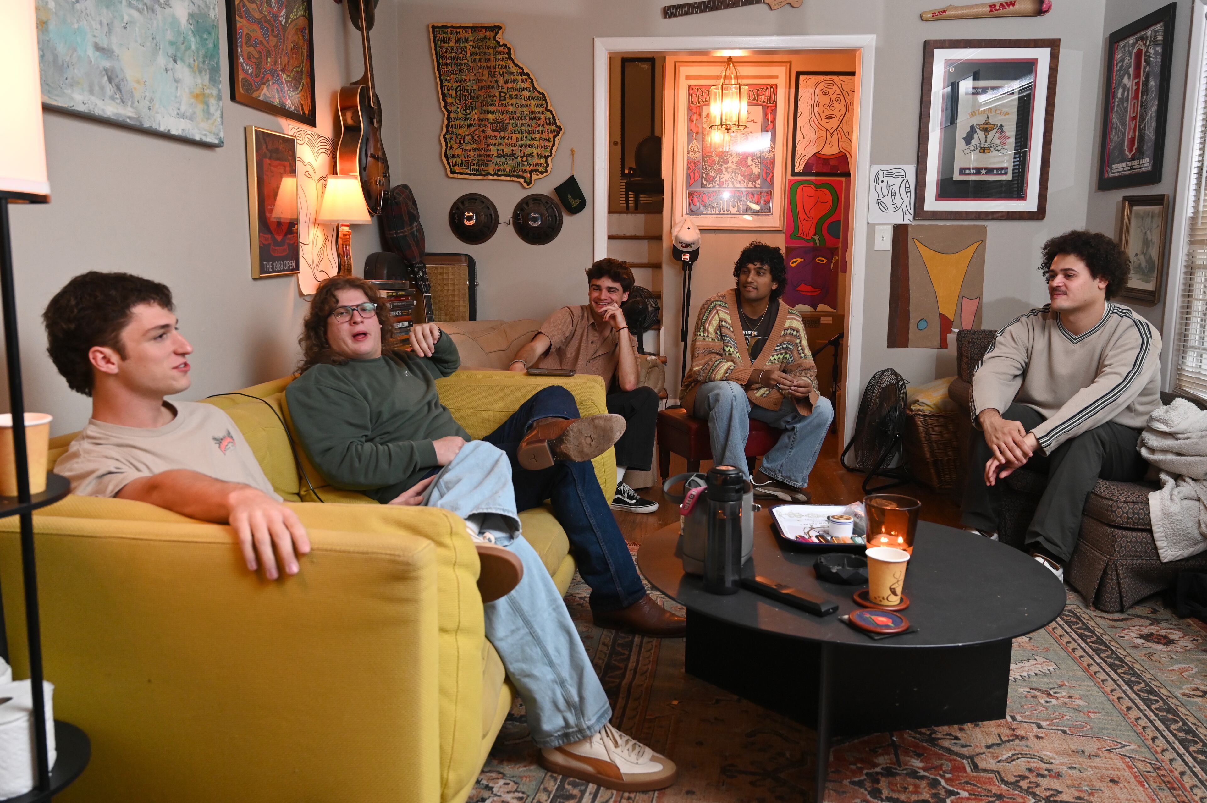 Charles Eastman (from left), Max Moore, James Kopp, Koan Roy-Meighoo and Anthony Smith acknowledge that adjusting to life on the road can be arduous, but it helps build chemistry. This month, Penelope Road will perform three Atlanta shows in different locations. (Hyosub Shin/AJC)