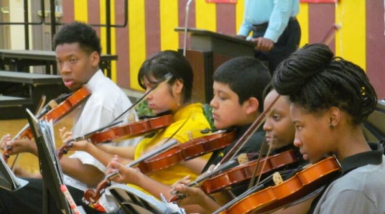 The Martin Luther King Jr., Middle School orchestra performs during the Black History Artists Showcase in March. Special to AJC