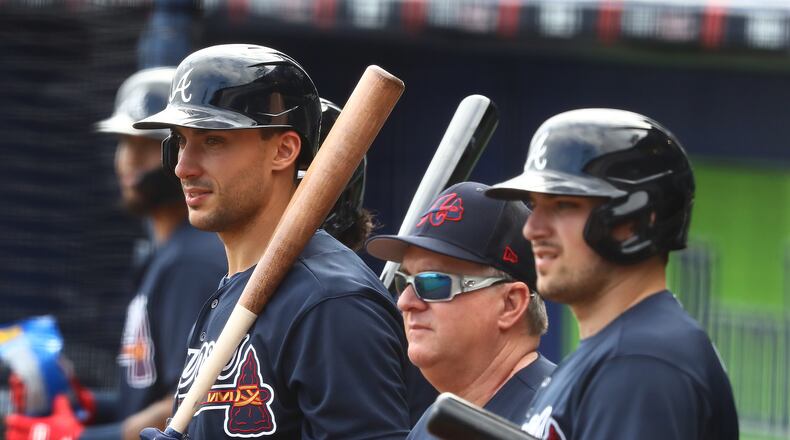 031622 North Port: Atlanta Braves first baseman Matt Olson (from left), hitting coach Kevin Seitzer, and third baseman Austin Riley watch pitcher Dylan Lee throw live batting practice during Spring Training at CoolToday Park on Wednesday, March 16, 2022, in North Port. “Curtis Compton / Curtis.Compton@ajc.com”