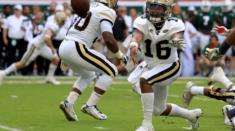 MIAMI GARDENS, FL - OCTOBER 14: TaQuon Marshall #16 of the Georgia Tech Yellow Jackets pitches the ball during a game against the Miami Hurricanes at Sun Life Stadium on October 14, 2017 in Miami Gardens, Florida. (Photo by Mike Ehrmann/Getty Images)