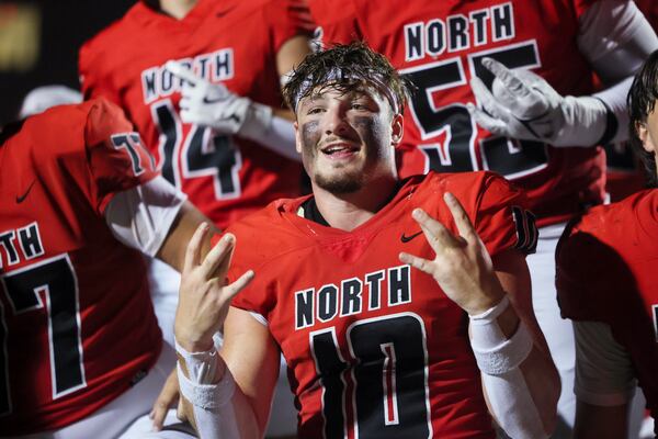 North Gwinnett linebacker Jake Godfree celebrates his team’s 21-7 win against Colquitt County at Tom Robinson Field at North Gwinnett High School on Friday, Aug. 29, 2025, in Suwanee. (Jason Getz/AJC)