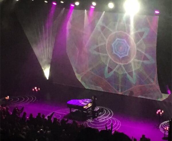 Prince plays piano during the first of the last two shows he ever performed, at the Fox Theatre in Atlanta. (Yvonne Zusel/AJC 2016)