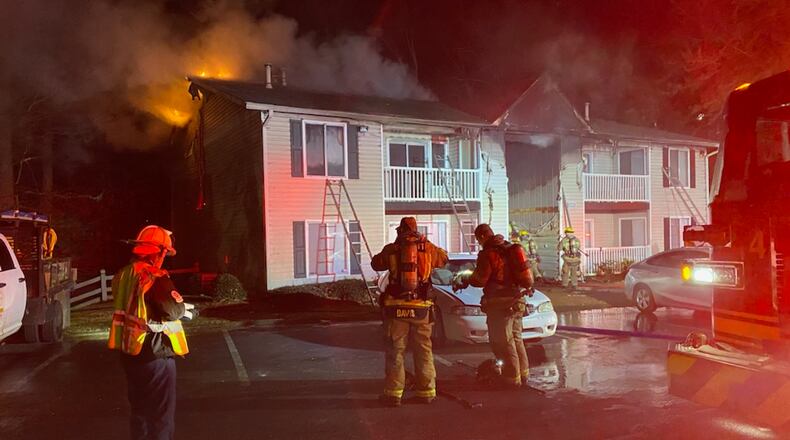 About 20 residents were displaced Saturday morning when a fire ripped through a Peachtree Corners apartment building.