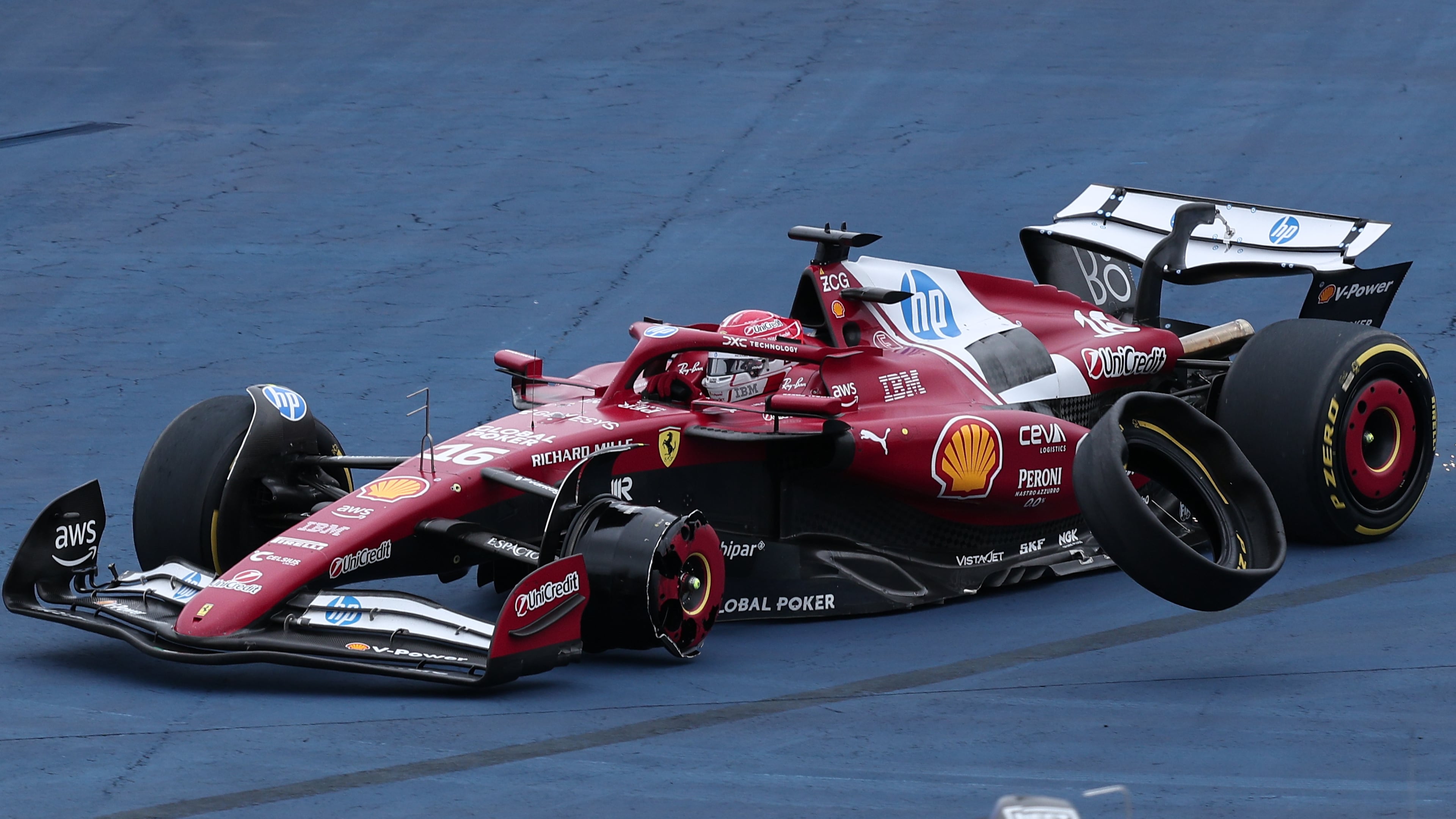 Ferrari driver Charles Leclerc of Monaco loses a tyre during the Brazilian Formula One Grand Prix at the Interlagos race track, in Sao Paulo, Sunday, Nov. 9, 2025. (AP Photo/Ettore Chiereguini)