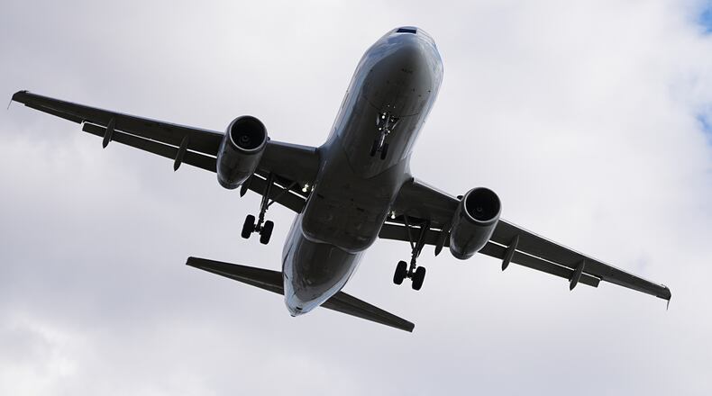 An aircraft approaches Philadelphia International Airport in Philadelphia, Thursday, Nov. 6, 2025. (AP Photo/Matt Rourke)