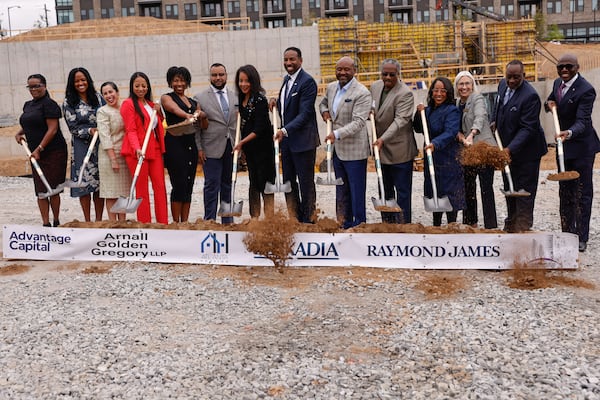 Atlanta Mayor Andre Dickens (center), city officials and community members gather Tuesday, Sept. 30, 2025, for the groundbreaking of the Englewood multifamily development on the former Englewood Manor site in Atlanta. (Natrice Miller/AJC)