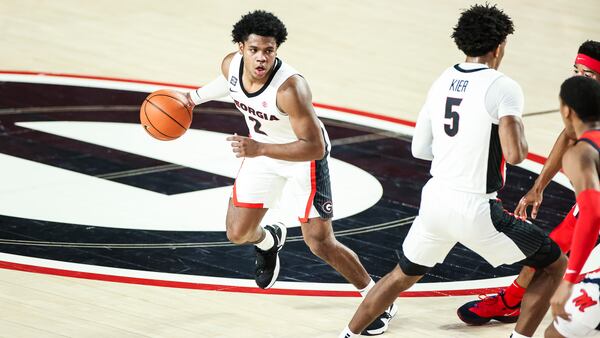 Georgia guard Sahvir Wheeler (2) set sets up the offense against Ole Miss Saturday, Jan. 30, 2021, at Stegeman Coliseum in Athens. (Tony Walsh/UGA Sports)