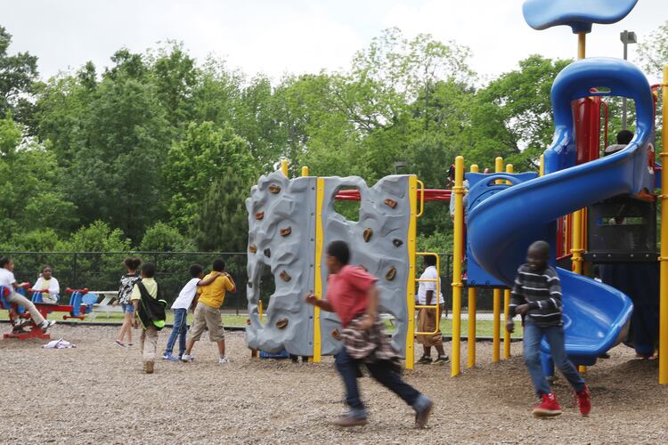 Children play on the playground at Dobbs Elementary School in Atlanta, Georgia, on Wednesday, May 1, 2019. (AJC file photo)