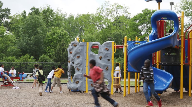In a guest column, educator Stacey Quinn-Kemp of Buford advocates for more recess time for Georgia students. Here, children are playing at Dobbs Elementary School in Atlanta in May 2019. (Emily Haney / AJC file photo)