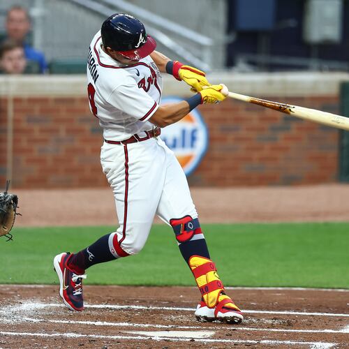 Atlanta Braves' Mauricio Dubón hits a two-RBI single in the first inning of a baseball game against the Athletics, Monday, March 30, 2026, in Atlanta. (AP Photo/Colin Hubbard)