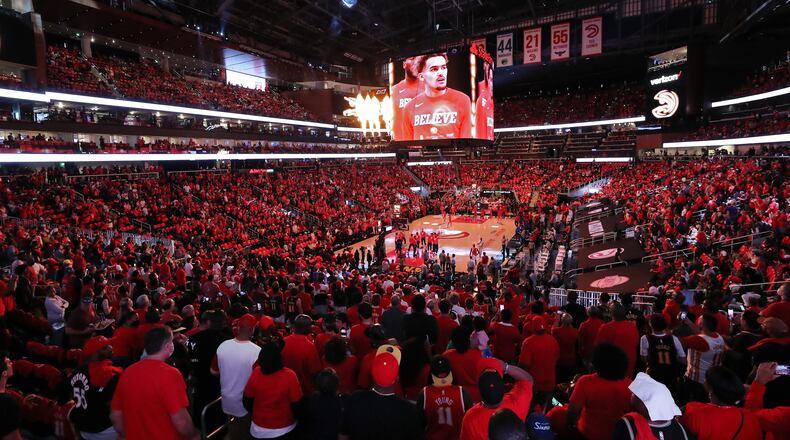 Atlanta Hawks fans look on as Trae Young and the Hawks take the floor of State Farm Arena to play the Philadelphia 76ers in Game 3 of their NBA Eastern Conference semifinals series on Friday, Jun 11, 2021, in Atlanta. Curtis Compton / Curtis.Compton@ajc.com