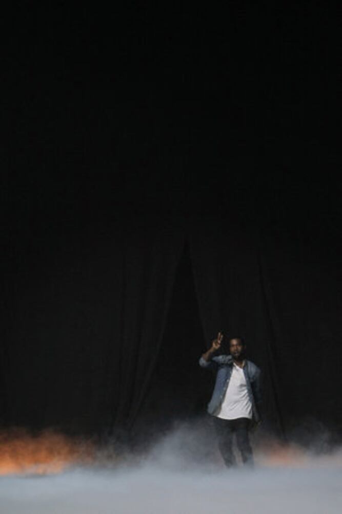 Kanye West unveils fashion line in Paris