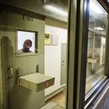 A prisoner looks out of his cell in the Special Management Unit at the Georgia Diagnostic and Classification Prison in this 2015 file photo. In a damning ruling, U.S. District Judge Marc Treadwell wrote in April that state prison officials showed no desire or intention to make the required changes to SMU's solitary confinement practices. (David Goldman/AP 2015 file)
